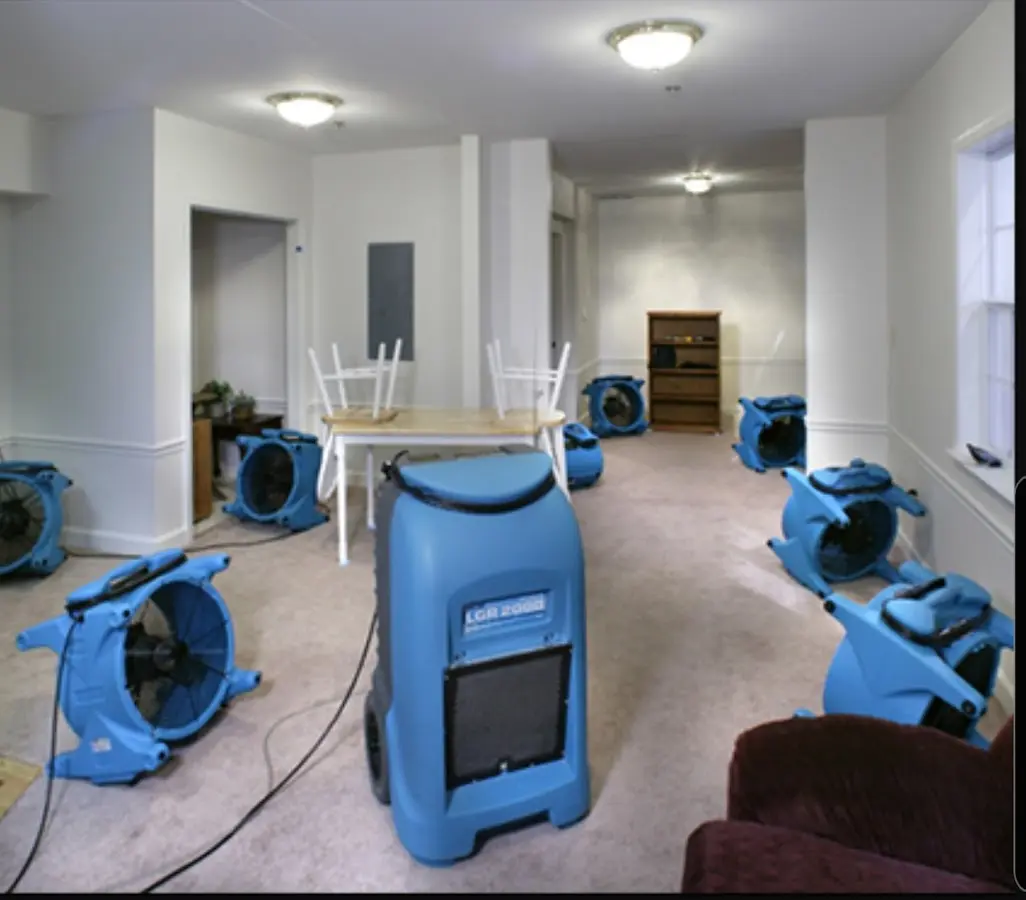Air movers and dehumidifier setup for Water Extraction & Removal in El Campo