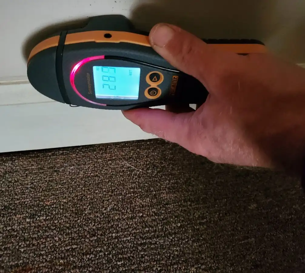 Moisture detection at baseboard during Sewage Cleanup & Sanitation in El Campo